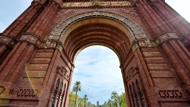 The Arc de Triomf located in Ciutadella Park in Barcelona downtown, Spain. Going through it, greenery around
