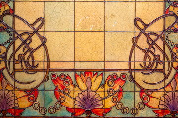Art deco colorful floral styled decoration on walls, cellar and lights in traditional French cafe...