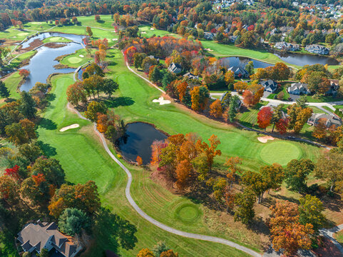 aerial view of luxury residential community and golf course