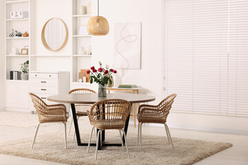 Stylish dining room interior with comfortable furniture. Space for text