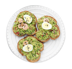 Slices of bread with tasty guacamole and eggs isolated on white, top view