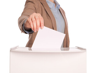 Woman putting her vote into ballot box on white background, closeup