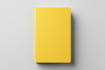 Mockup blank yellow book on white design paper background.