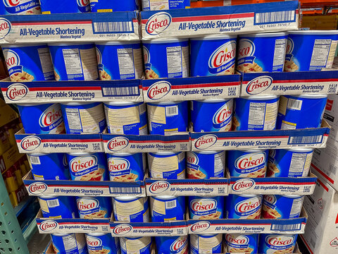 BAXTER, MN - 24 JUN 2023: Cans of Crisco All Vegetable Shortening on display and for sale at Costco store.