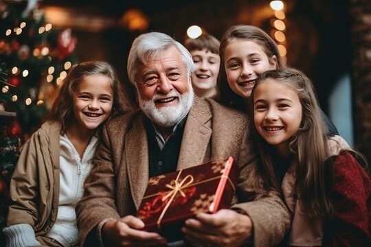 Happy big family with grandparents sitting on the couch eating christmas chocolate, photography.