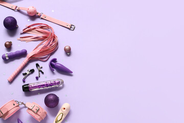 Different sex toys with Christmas decor on purple background - obrazy, fototapety, plakaty
