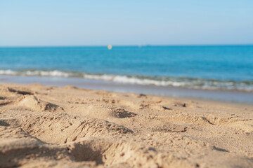 Tropical sea beach with sand and wave of the sea