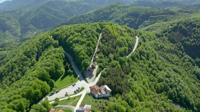 Aerial top down shot of parking area and path to Krastova Gora in Rhodope Mountains in summer