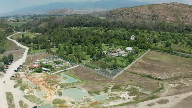 Pull-in aerial drone shot of St. Petka church and memorial shrine built through the monetary funds given by Baba Vanga, in Rupite, Petrich in Northeast Bulgaria. 