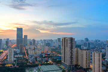 Fototapeta na wymiar Hanoi skyline cityscape during sunset period at Pham Hung street in Cau Giay district in 2020