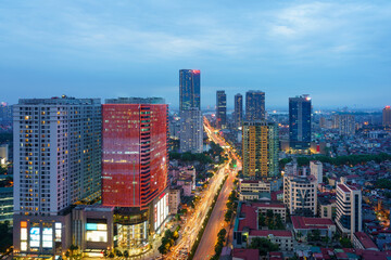 Fototapeta premium Cityscape of Hanoi skyline at Nguyen Chi Thanh street, Dong Da district during sunset time in Hanoi city, Vietnam in 2020