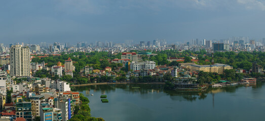 Fototapeta na wymiar Hanoi cityscape with skyline view during sunset period at West Lake ( Ho Tay ) in 2020