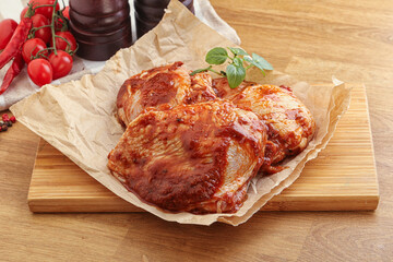 Marinated chicken leg in tomato sauce