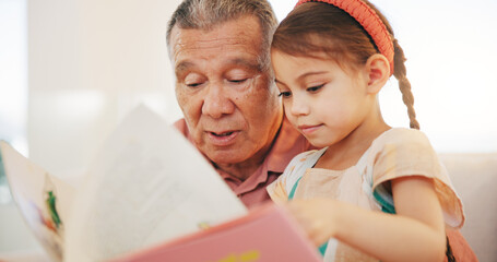 Grandparent, kid and reading book with smile, home and child development, grandchild and couch....