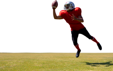 Digital png photo of american football player jumping for ball on transparent background