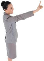 Zelfklevend Fotobehang Aziatische plekken Digital png photo of happy asian businesswoman pointing on transparent background
