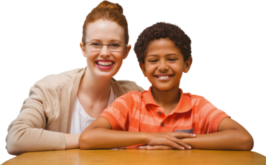 Digital png photo of diverse female teacher with schoolboy at desk on transparent background