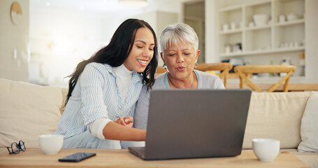 Woman, senior mom and laptop with teaching, reading and typing for email notification, web or search. Computer, elderly mother and daughter with click, learning and family home lounge on social media