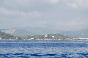 Beautiful sights in Ibiza Spain of the rugged coast, Mediterranean sea and charming architecture 