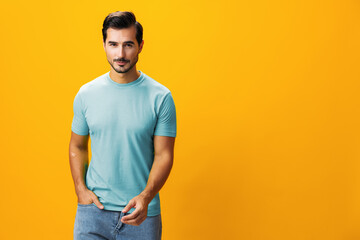 Man arm studio lifestyle portrait yellow smiling confident style trendy copy fashion space gesture background laughing