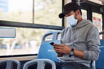 Mask, phone and man travel in bus, journey and typing email on mobile app technology. Smartphone,...