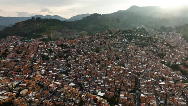 Aerial view overlooking a dense community of poor homes in Comuna 13, Colombia