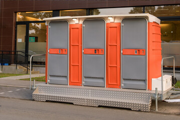 Mobile, mobile, temporary toilet for the public installed on a city street