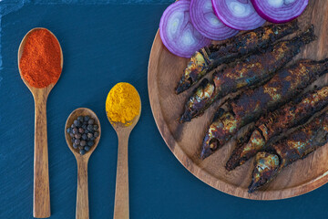 Kerala-Style Mathi Fish Fry: A Spicy Sardine Delight Bursting with Flavour. Kerala's seafood...