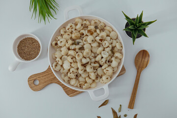 Rice dumplings - Famous sourashtra snack recipe with pepper, jeera and curry leaves. Localled called neer Kozhukattai. Also called Thanni Kozhukattai. Made with rice flour. 