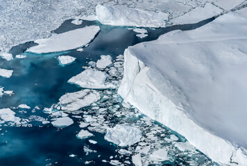 Icebergs floating in the water. Global warming and climate change concept