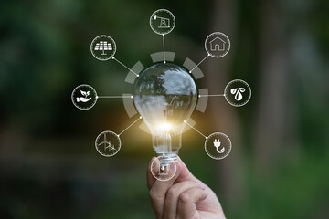 Light bulb Energy saving green nature background