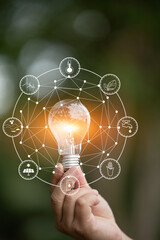 Light bulb Energy saving green nature background