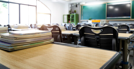 Stack of books on the desks