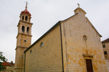The historic 16th century Assumption of Our Lady Parish Church in the coastal village of Sutivan on...