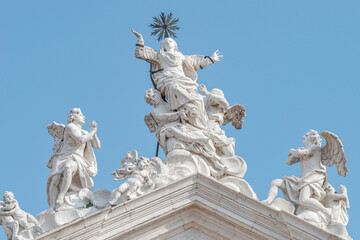 Venice, Italy. Beautiful angels with wings and Saint Maria statues at the roof of Church Chiesa di...