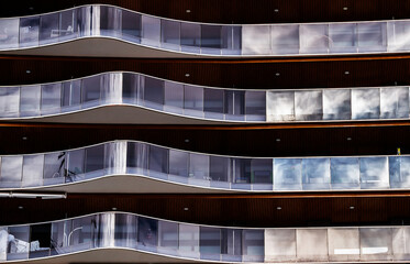 reflections in the glass of the balconies