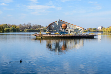 Landscape with decorative fountain on Plumbuita lake (Lacul Plumbuita) and park, in Bucharest,...