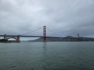 Fototapeta na wymiar View of Golden gate bridge in San Francisco California from the shoreline of the bay