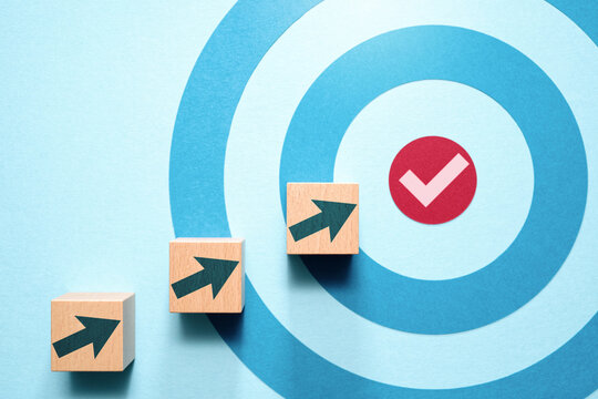 Setting goal and goal achievement. Target and arrow marks. Concept image of business plan and career.