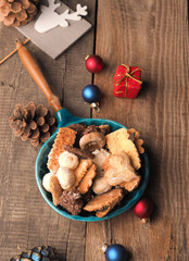 Christmas cookies in a bowl on a wooden table