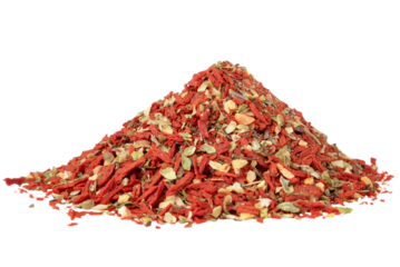 Dried and ground tomatoes, basil and garlic isolated on a transparent background.