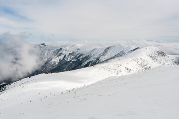 Winter mountain landscape with sun, Turiec region and view of Mala Fatra mountain range in winter. Slovakia