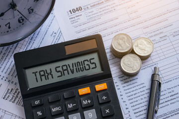 Tax Savings concept on calculator.Business, statistics, analytic research, income, return,...