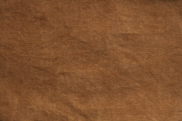 Texture of brown corduroy close-up