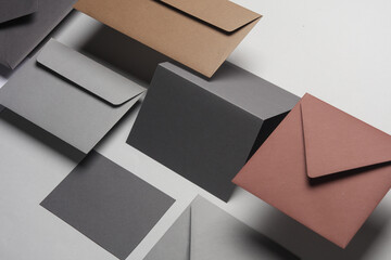 Floating envelopes and cards on gray background with shadow. Minimalism, modern business still...
