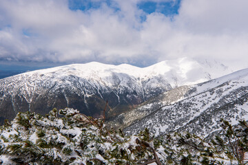 Winter landscape mountains scenery blue sky. Babky, West Tatras, Liptov, Liptovsky Mikulas, Slovakia. Snow-covered mountain top. Winter hiking.