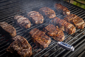 Beef steaks on grill