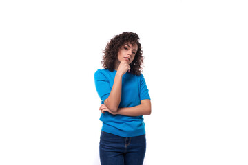 young strong woman in a blue sweater with curly hair