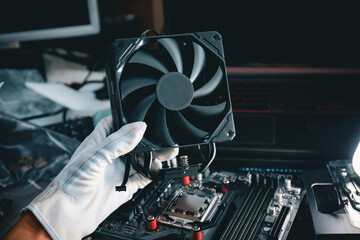 Installing or repair the air cooling system of the personal computer processor.