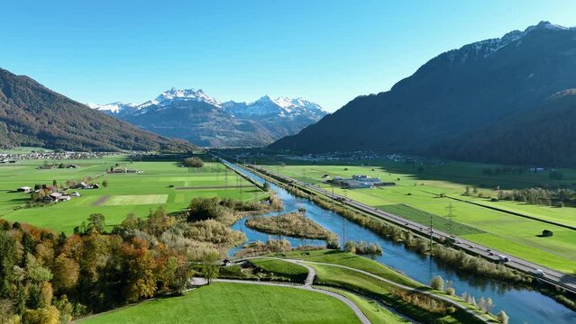 Aerial view of beautiful Swiss mountainside above Linth river in Switzerland